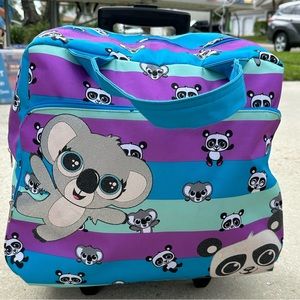 New Justice Rolling Duffle with Sleeping Bag and Pillow